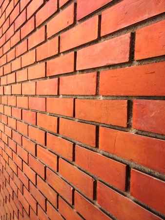 Clay brick wall.