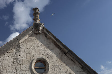 church facade with architectural sculptureの写真素材