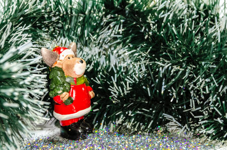 Snowy carrying Christmas tree の写真素材