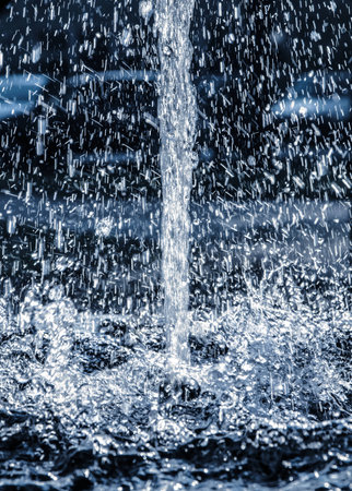 Water splashing from the fountain close-up の写真素材