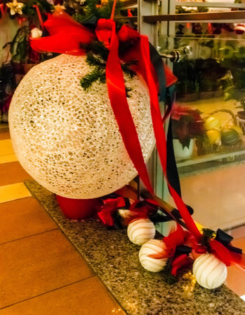 White Cristmas ball with ribbons の写真素材