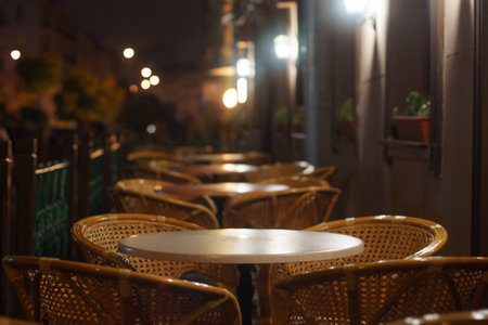 Empty cafe tables in the eveningの写真素材