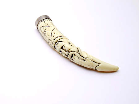 Ivory souvenir on whiteの写真素材