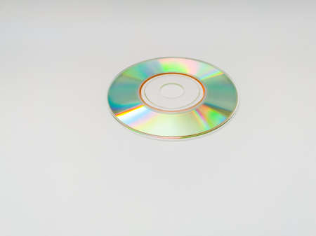 Mini CD or compact disc bottom side, object isolated on a white background