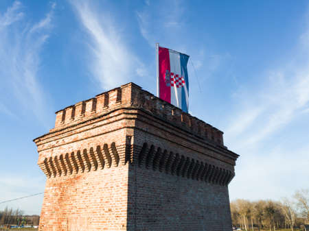 Cathedral of Saints Peter and Paul in Osijek, silhouette of architecture against the bright sky.のeditorial素材