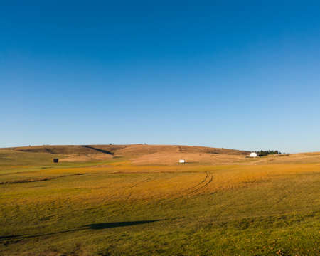 Beautiful landscape with pastures on the mountain Zlatibor in Serbia just before sunsetの写真素材