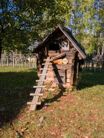 Open-air museum of an old village or ethno village with old wooden traditional buildings in the village of Sirogojno on the mountain Zlatibor in Serbiaのeditorial素材