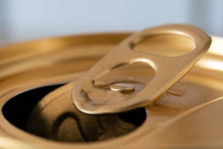 Top of opened soda can in close up, pull tab or sntntn