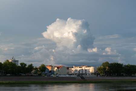 Huge cumulonimbus cloud above city of Slavonski Brod in Croatia on shore of Sava riverの写真素材