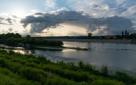 Landscape of Sava river during cloudy afternoon, dramatic cloudsの写真素材