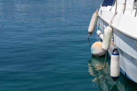 Fender buoy hang on boat side, anti collision protectionの写真素材
