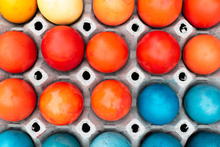 Easter eggs in cardboard egg tray, rows of eggsの写真素材