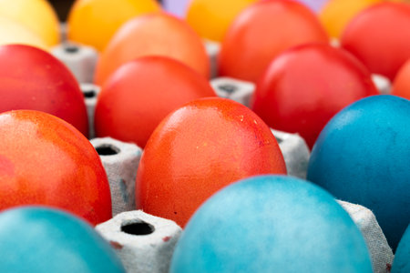 Easter eggs in cardboard egg tray, rows of eggsの写真素材