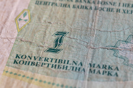 Close up of banknote money of Bosnian convertible mark, uncirculated bill of one mark, old and wearの写真素材