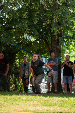 Draft keg throwing contest at moto camp in Prnjavor during moto meet