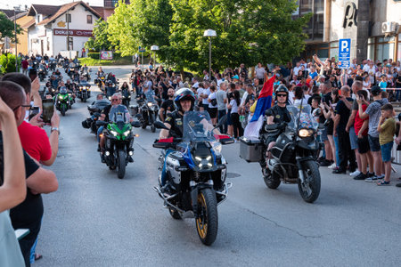 Motorcycle parade in Prnjavor, sidewalks are full of peopleのeditorial素材