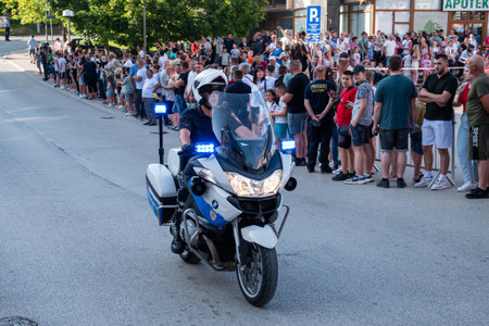 Motorcycle parade in Prnjavor, sidewalks are full of peopleのeditorial素材