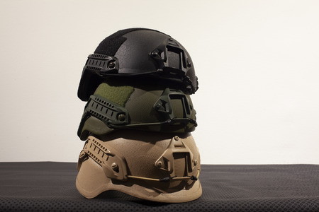 Three military helmets on white backgroundの写真素材
