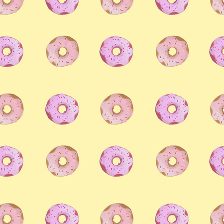 donuts pattern on yellow backgroundの写真素材