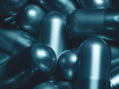 Pile of capsules as background, closeup. Health care conceptの写真素材