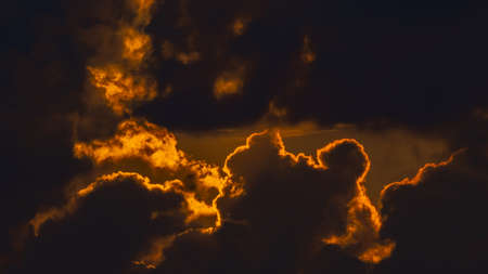 Dramatic sky with clouds at sunset. Dramatic cloudscape. Nature background