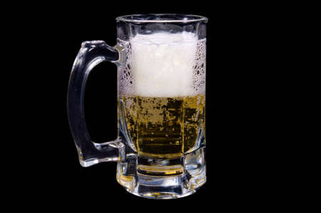 mug beer on black backgroundの写真素材