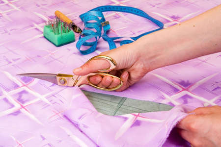 dressmaker cuts scissors fabricsの写真素材