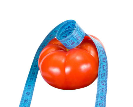 tomato and tape measure isolated on white backgroundの写真素材