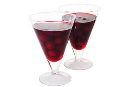 cerise dessert in glass isolated on white backgroundの写真素材