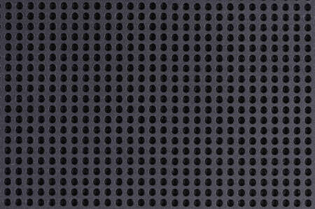 metal grid with some holes in itの写真素材