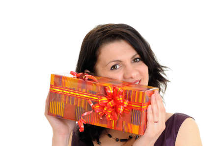 woman with orange gift isolated on white backgroundの写真素材