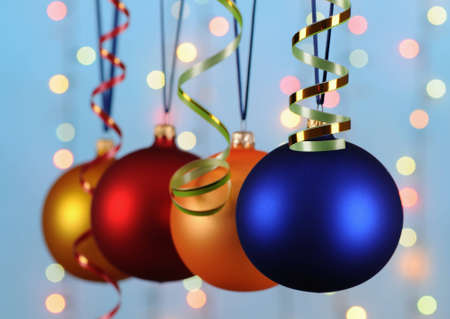 multicoloured christmas-tree decorations on blue backgroundの写真素材