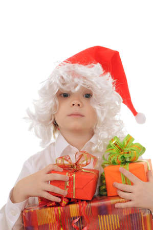 The child in a hat santa claus isolated on white backgroundの写真素材
