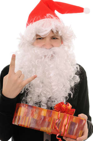 The teenager in a hat santa claus isolated on white backgroundの写真素材