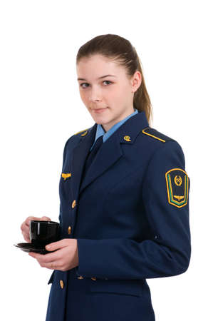 girl in the uniform of the railway with a cup isolated on white backgroundの写真素材