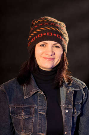 portrait of a woman in a  knitted hatの写真素材