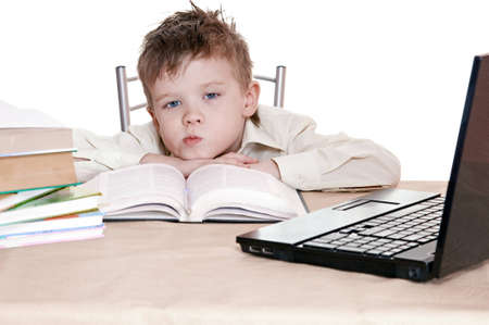 boy pupil thinks for in time  homeworkの写真素材