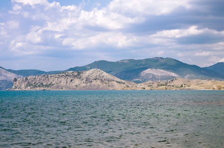 storm clouds over the rocky sea shore