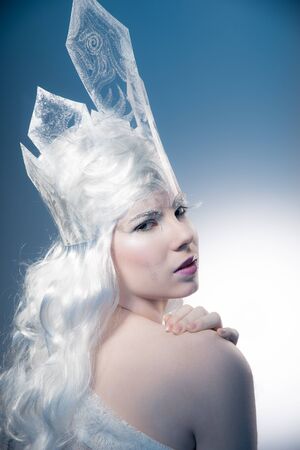 Winter Beauty Woman. Christmas Girl Makeup.Winter Queen with Snow and Ice crown.の写真素材