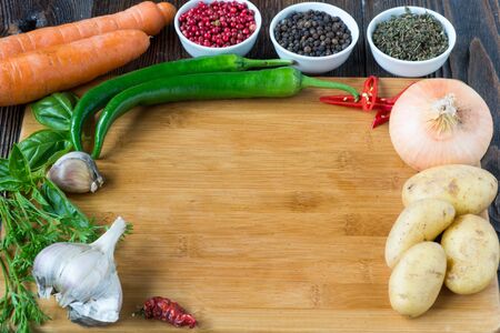 Ready to cook  vegetables, served over dark textured background. Top view. Copy spaceの写真素材