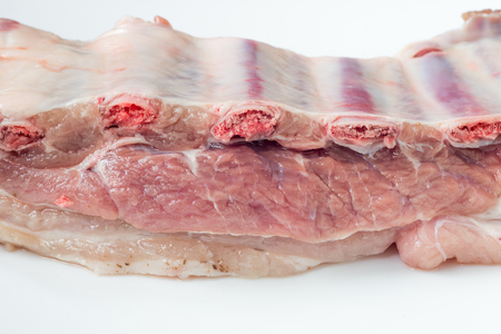 Raw pork  ribs on white backgroundの写真素材