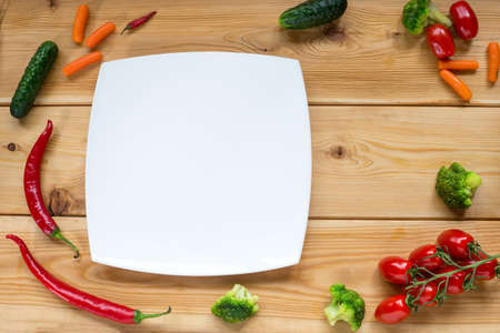 Healthy food background and Copy space / studio photography of raw tomatos  on black wooden table. Top view.の写真素材
