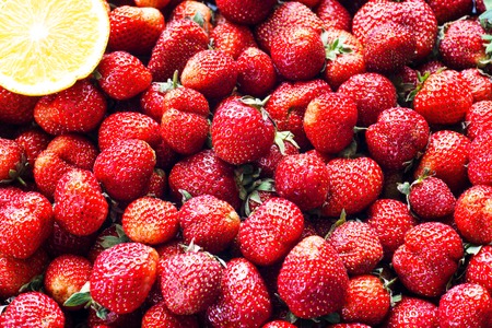 Fresh strawberry background. Ripe strawberry in close-up.の写真素材