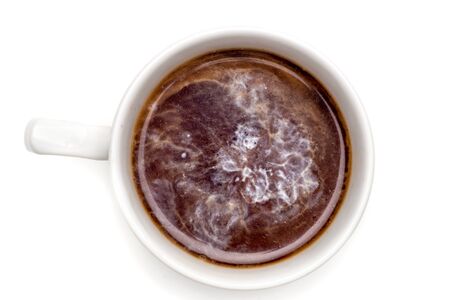 Coffee cup with milk top view isolated on white background.の写真素材