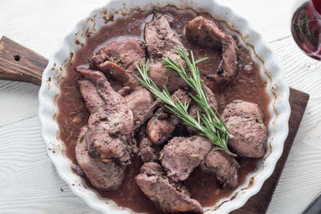 Prapered  chiken meat marinated in red wine with spices, rosemary
