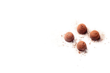 Truffles pattern, top view flat lay of various chocolate sweets. Minimal concept above decoration on white food background. Chocolate Candy, Truffle.の写真素材