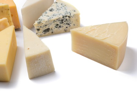Various types of cheese isolated on white