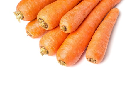 Orange carrots washed. Carrots for diet and healthy eating. Vegetables isolated on white background.の写真素材