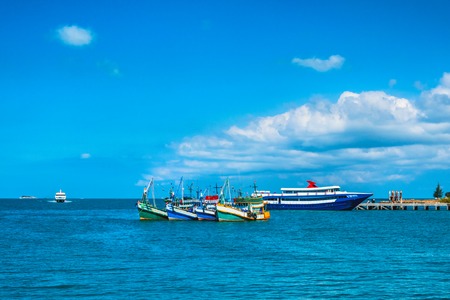 Traditional old wooden fisherman boats lying in harbor in ko Phangan, Thailand