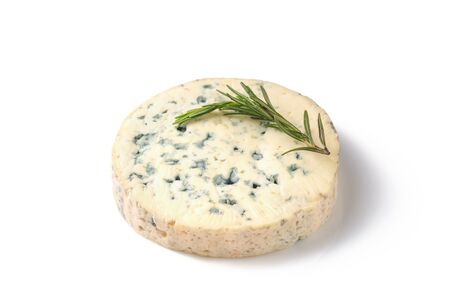 One round piece of blue cheese, Dor Blue and rosemary isolated on white.の写真素材